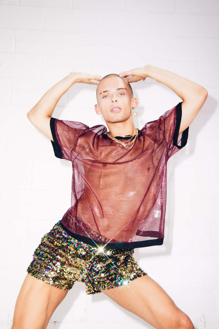 Man wearing sheer sparkly red T-Shirt