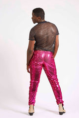 Man wearing pink sequin pants