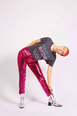 Woman wearing pink sequin pants